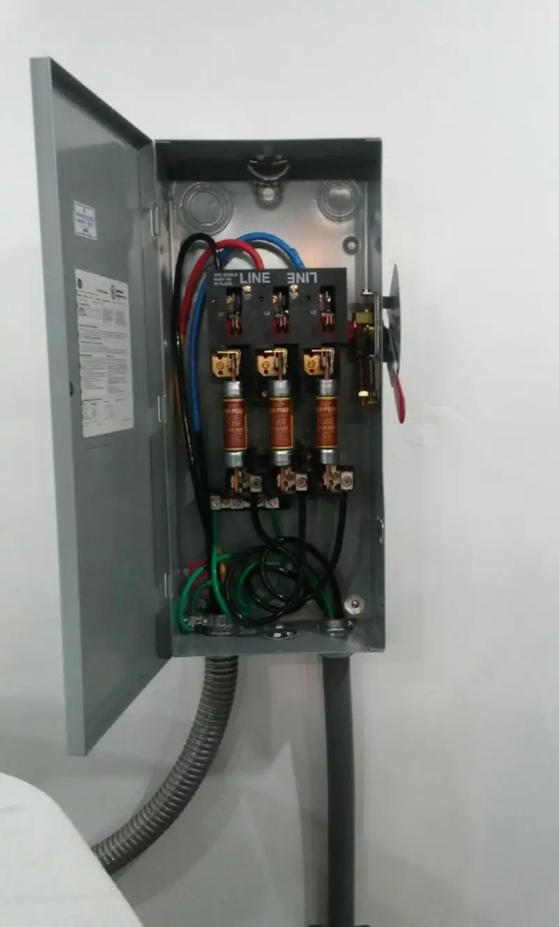 Three-phase disconnect switch installed for Smoke Detector Installation in Corning