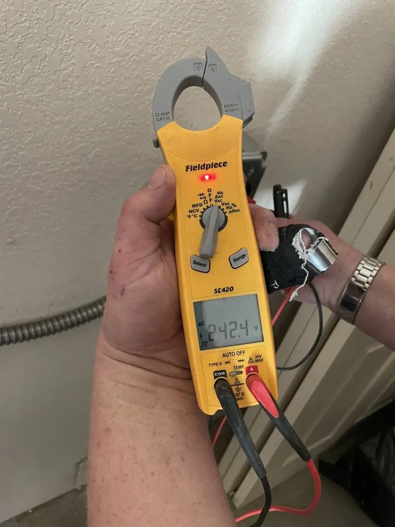Voltage testing with clamp meter during Generator Installation in Corning